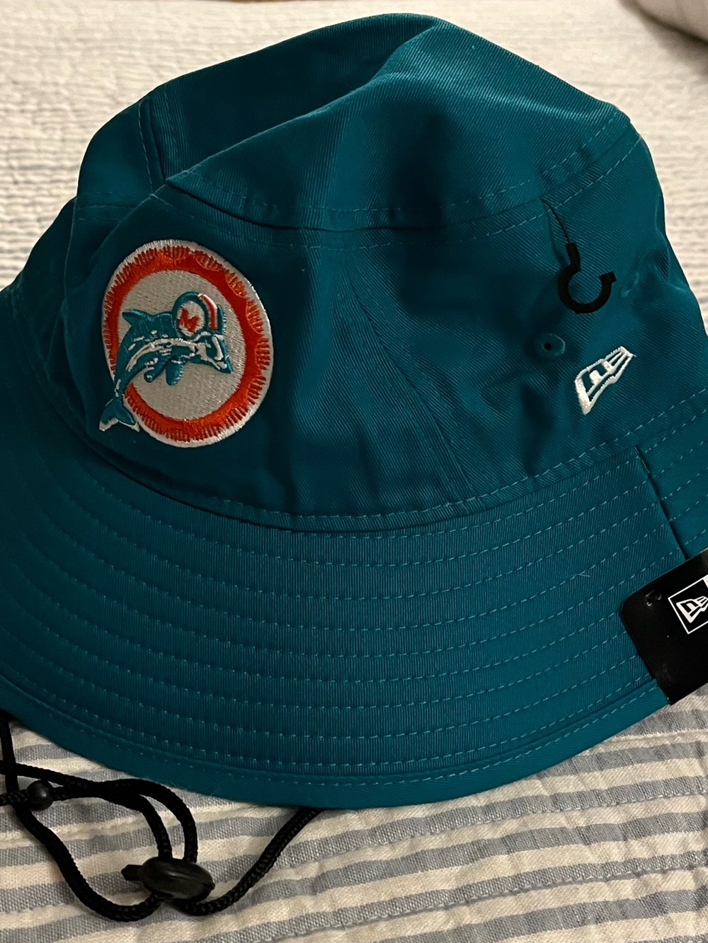 NFL Teal Bucket Hat with Black Chin Strap. NWT. Size Small/Medium